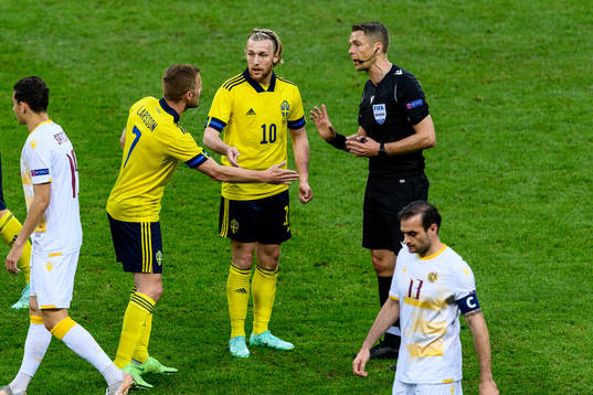 Sebastian Larsson and Emil Forsberg of Sweden in a