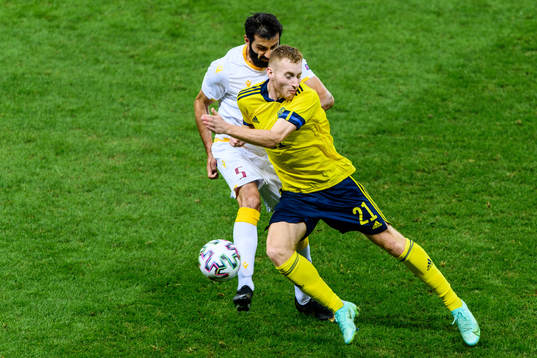 Artak Grigoryan of Armenia and Dejan Kulusevski of Sweden