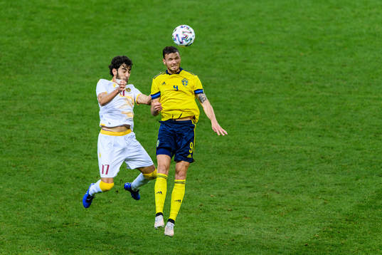 Albert Khachumyan of Armenia and Marcus Berg of Sweden