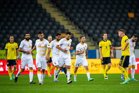 Vahan Bichakhcyan of Armenia celebrates with teammates