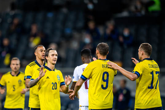Kristoffer Olsson, Robin Quaison and Marcus Berg celebrates