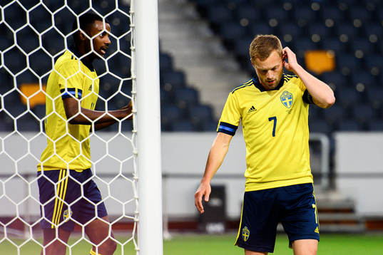 Alexander Isak and Sebastian Larsson of Sweden