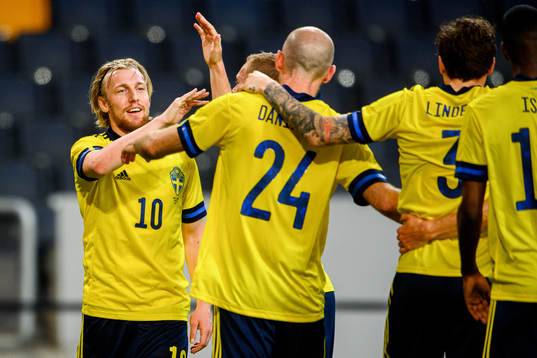 Emil Forsberg and Marcus Danielson of Sweden celebrate the