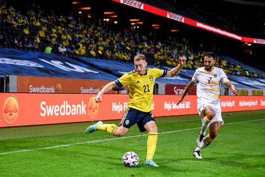 Dejan Kulusevski of Sweden and Andre Jack Calisir of Armenia