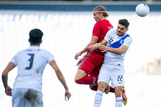 Erling Braut Haaland of Norway and Konstantinos Mavropanos
