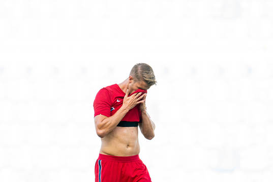 Kristoffer Ajer of Norway looks dejected