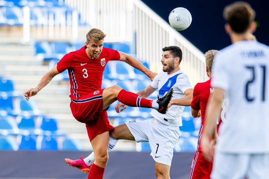 Kristoffer Ajer of Norway and Giorgos Masouras of Greece