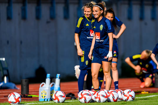 Goalkeeper Jennifer Falk and Kosovare Asllani of the