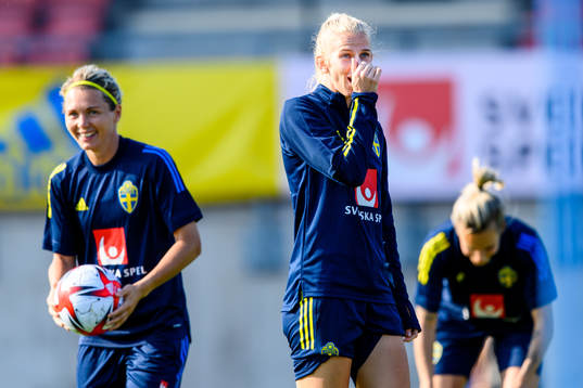 Goalkeeper Jennifer Falk and Sofia Jakobsson of the Swedish