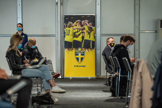 A banner of the Swedish national football team at a press