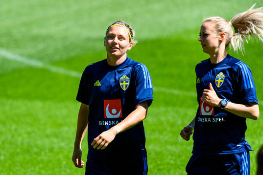 Goalkeeper Jennifer Falk and Amanda Ilestedt of the Swedish