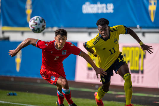 Eldin Dzogovic of Luxembourg and Anthony Elanga of Sweden