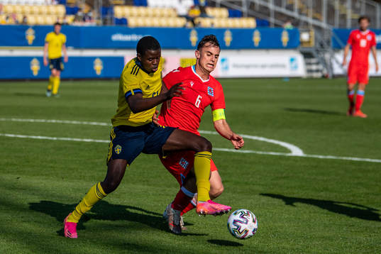Benjamin Mbunga Kimpioka of Sweden and Irvin Latic of