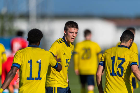 Emil Holm celebrates with Anthony Elanga of Sweden