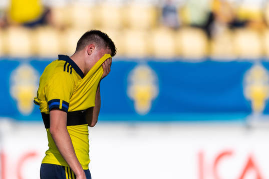 Emil Holm of Sweden looks dejected