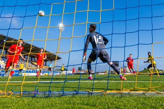 Anthony Elanga of Sweden scores 3-0 behind goalkeeper