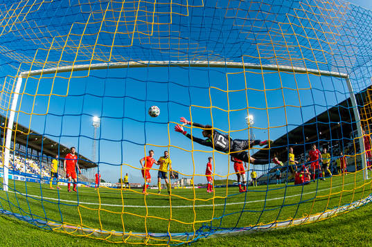 Patrik Wålemark of Sweden scores 5-0 behind goalkeeper