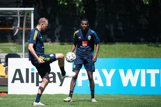 Andreas Granqvist  and Alexander Isak of the Swedish