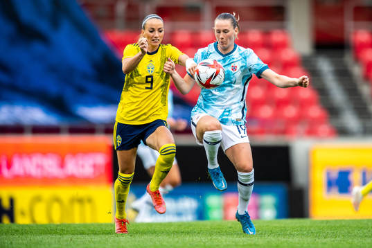 Kosovare Asllani of Sweden and Elisabeth Terland of Norway