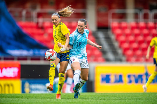 Kosovare Asllani of Sweden and Elisabeth Terland of Norway