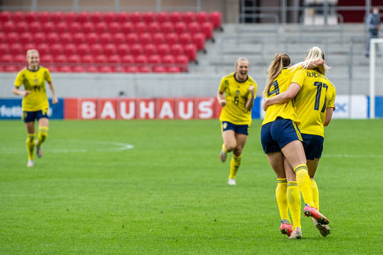 Kosovare Asllani and Stina Blackstenius of Sweden