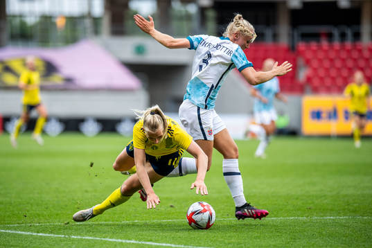 Stina Blackstenius of Sweden and Maria Thorisdottir of