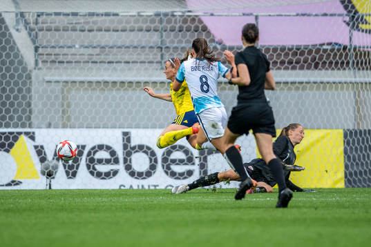 Kosovare Asllani of Sweden and goalkeeper Cecilie