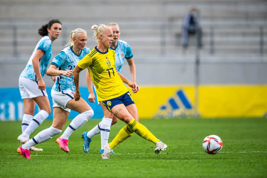 Karina Sævik of Norway and Caroline Seger of Sweden
