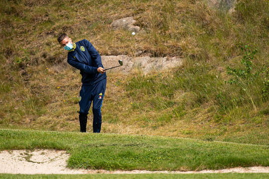 Mikael Lustig of the Swedish national football team golfing