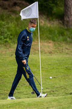 Mikael Lustig of the Swedish national football team golfing