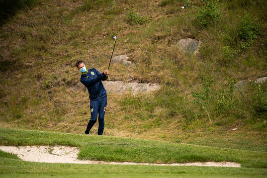 Mikael Lustig of the Swedish national football team golfing