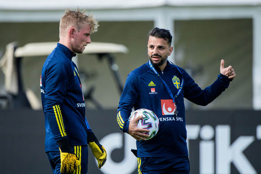Goalkeeper Jacob Rinne and Poya Asbaghi, temporary coach of