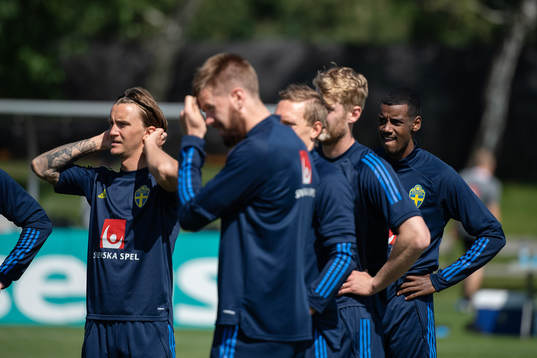 Kristoffer Olsson and Alexander Isak of the Swedish