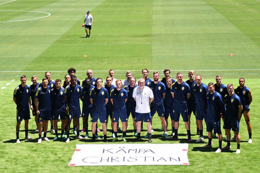 In this handout photo from UEFA players and coaching staff
