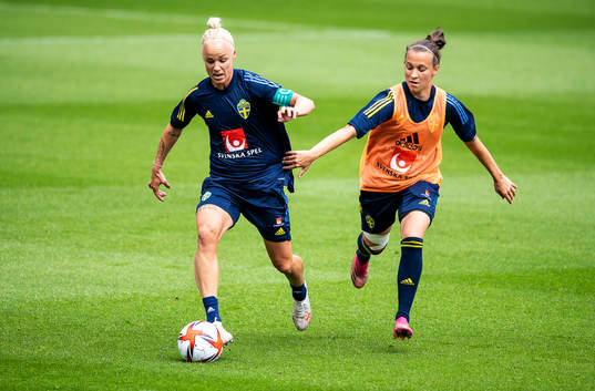 Caroline Seger and Julia Zigiotti Olme of Sweden