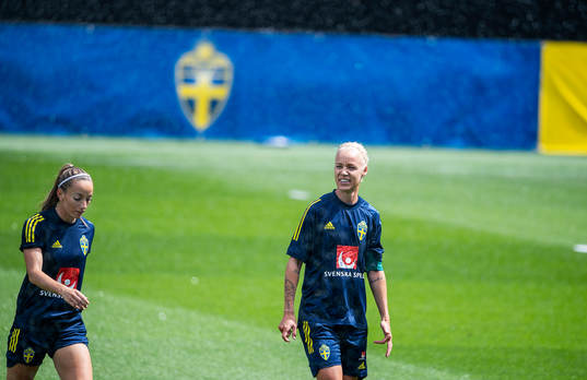 Kosovare Asllani and Caroline Seger of Sweden