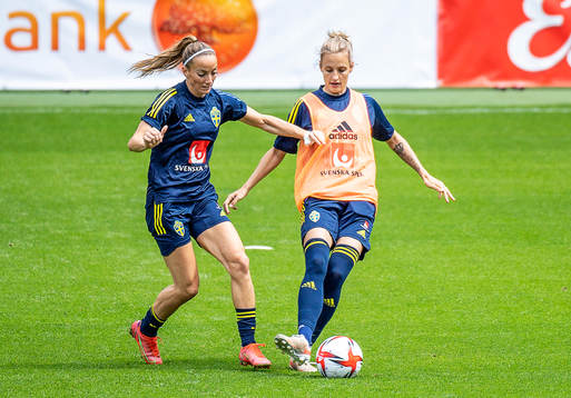 Kosovare Asllani and Nathalie Björn of Sweden
