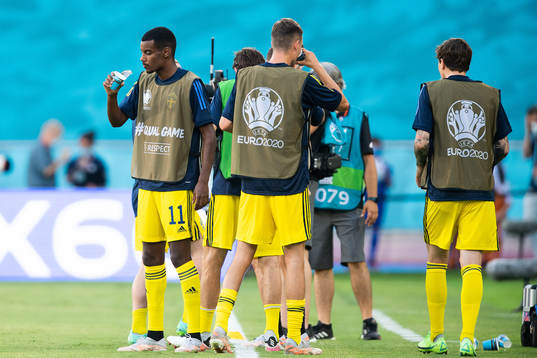 Alexander Isak of Sweden drinks water