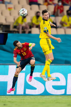Jordi Alba of Spain and Mikael Lustig of Sweden