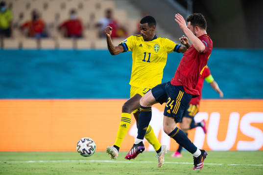 Alexander Isak of Sweden and Aymeric Laporte of Spain