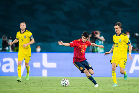 Pedri Pedri of Spain and Kristoffer Olsson of Sweden