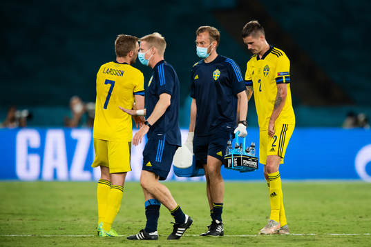 Mikael Lustig of Sweden leaves the pitch