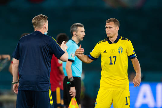 assistant coach Peter Wettergren and Viktor Claesson of