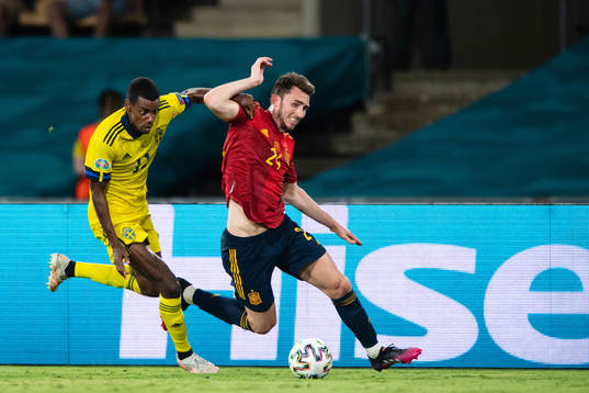 Alexander Isak of Sweden and Aymeric Laporte of Spain