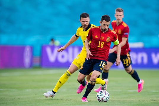 Marcus Berg of Sweden and Jordi Alba of Spain