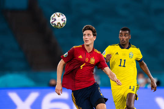 Pau Torres of Spain and Alexander Isak of Sweden