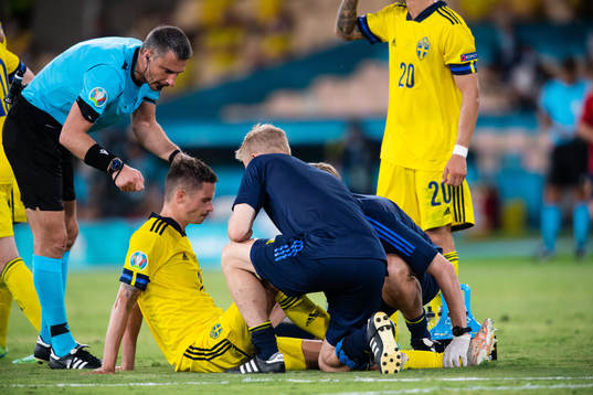 Mikael Lustig of Sweden in pain