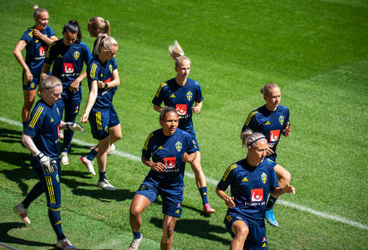 goalkeeper Hedvig Lindahl and Madelen Janogy of Sweden
