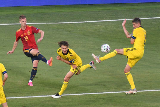 Dani Olmo of Spain against Koke Koke and Cesar Azpilicueta