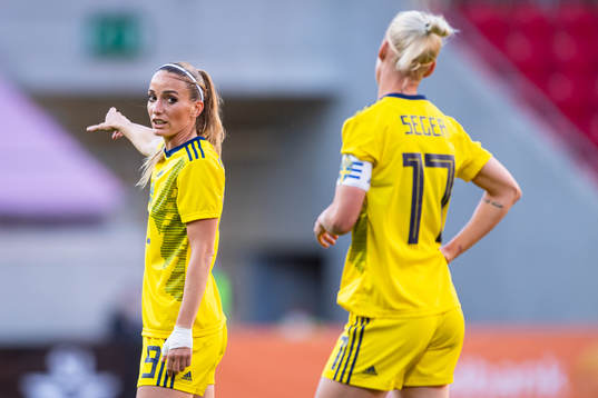 Kosovare Asllani and Caroline Seger of Sweden